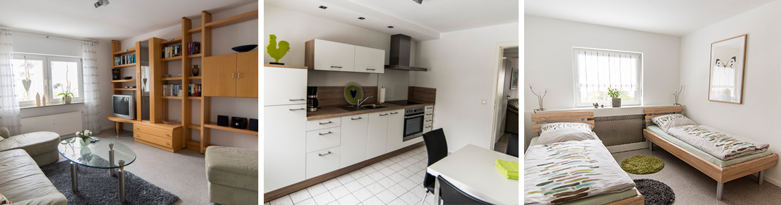 Ferienwohnungen im Ferienhaus Scheldequelle in Eschenburg – Küche, Schlafzimmer und Wohnzimmer